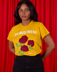 Kandia is 5'3" and wearing XXS 3 Roses Organic Tee