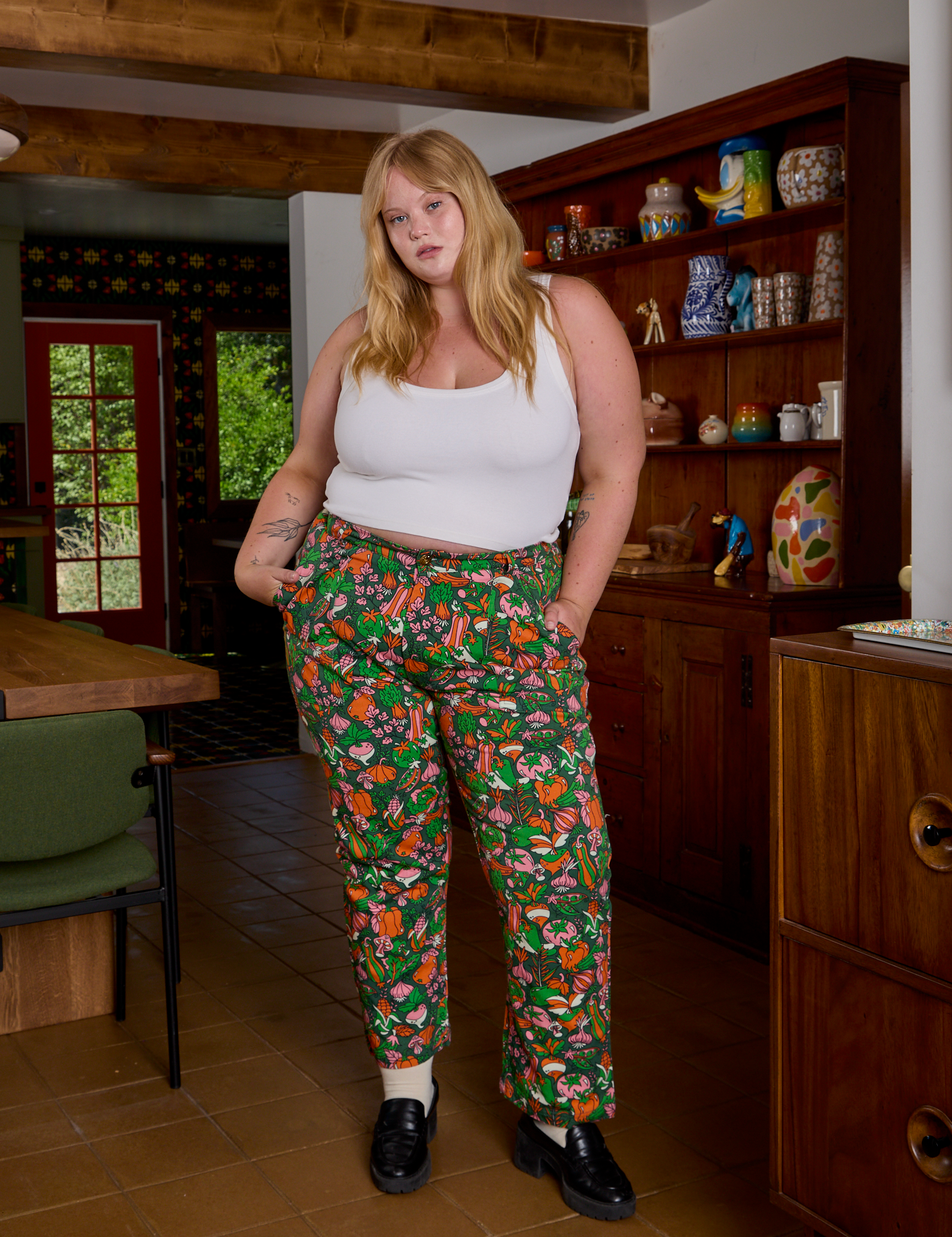 Juliet is 5&#39;7&quot; and wearing 1XL Work Pants in Kitchen Collection paired with a Cropped Tank in Vintage Tee White