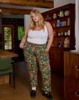 Juliet is 5'7" and wearing 1XL Work Pants in Kitchen Collection paired with a Cropped Tank in Vintage Tee White