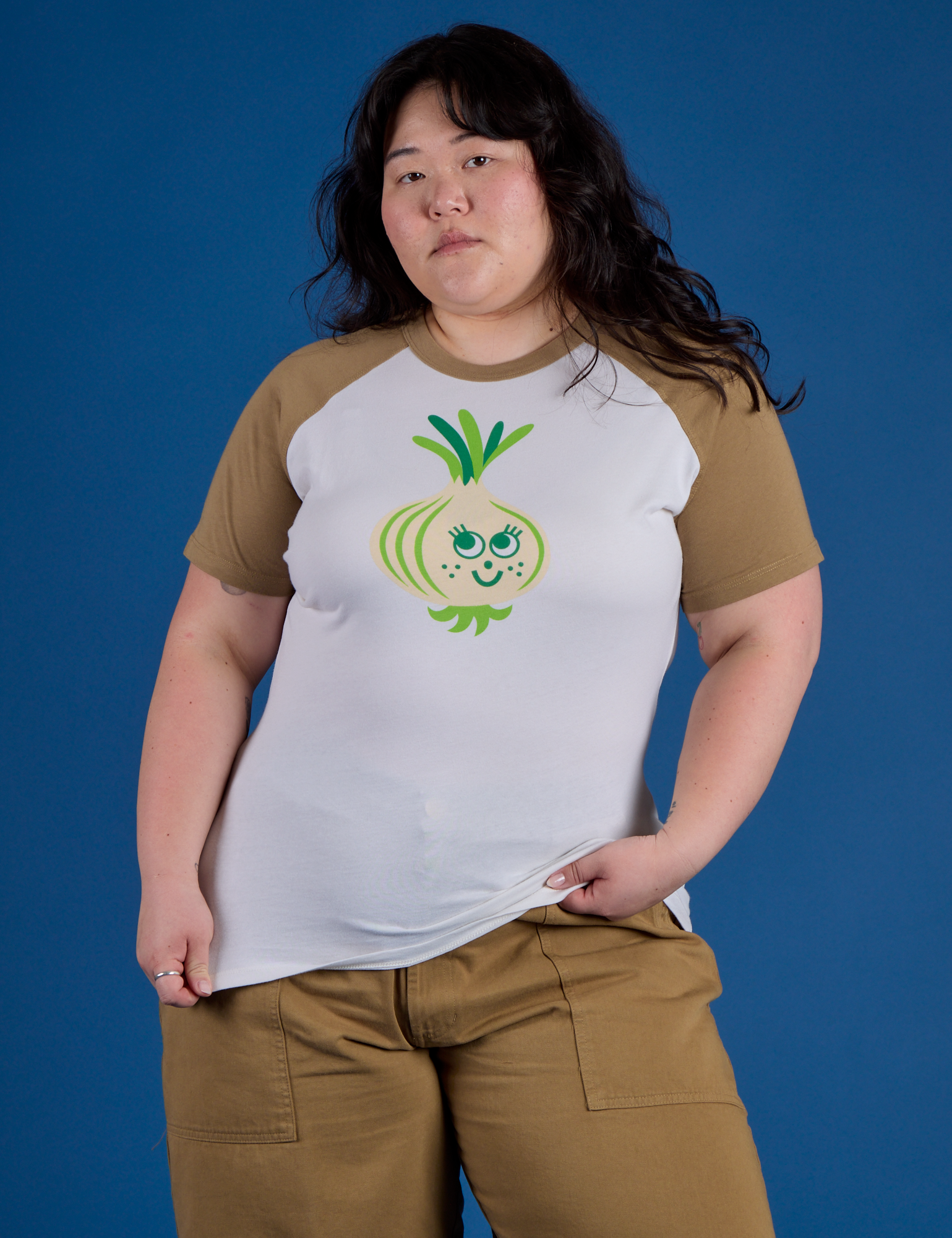 Ashley is 5’7” and wearing XL Produce Raglan Tee in Onion