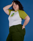 Side view of Produce Raglan Tee in Snap Peas on Ashley