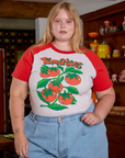 Juliet is 5'7" and wearing L Short Sleeve Raglan Tee in Tomatoes