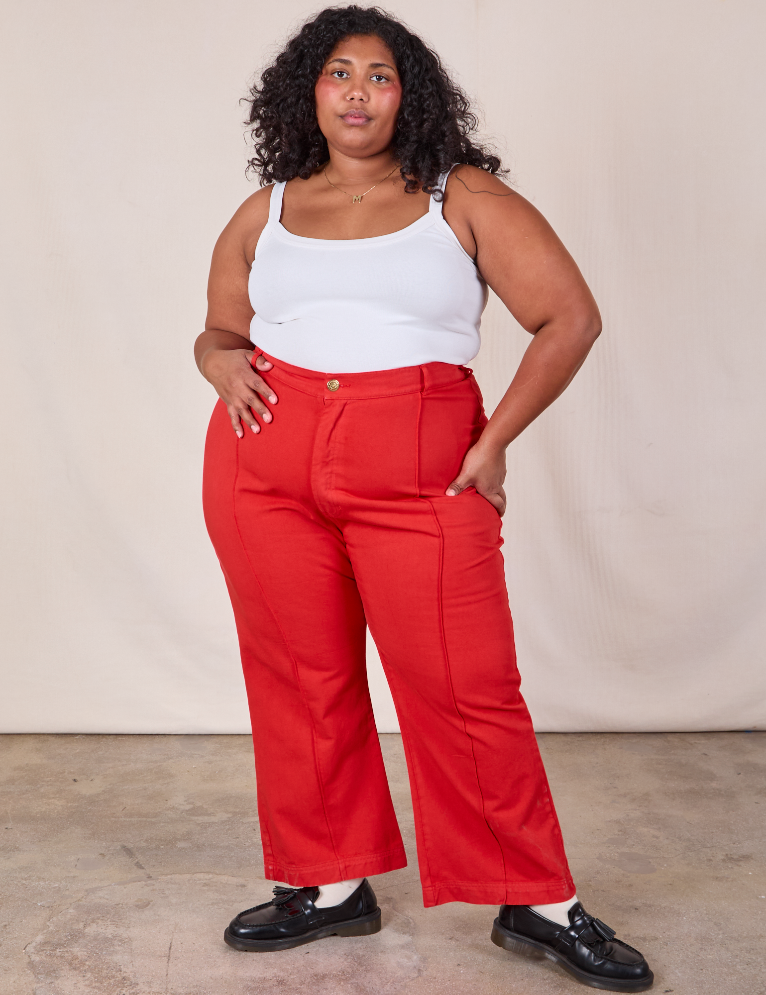 Morgan is 5&#39;5&quot; and wearing 2XL Western Pants in Mustang Red paired with a Cami in Vintage Tee Off-White