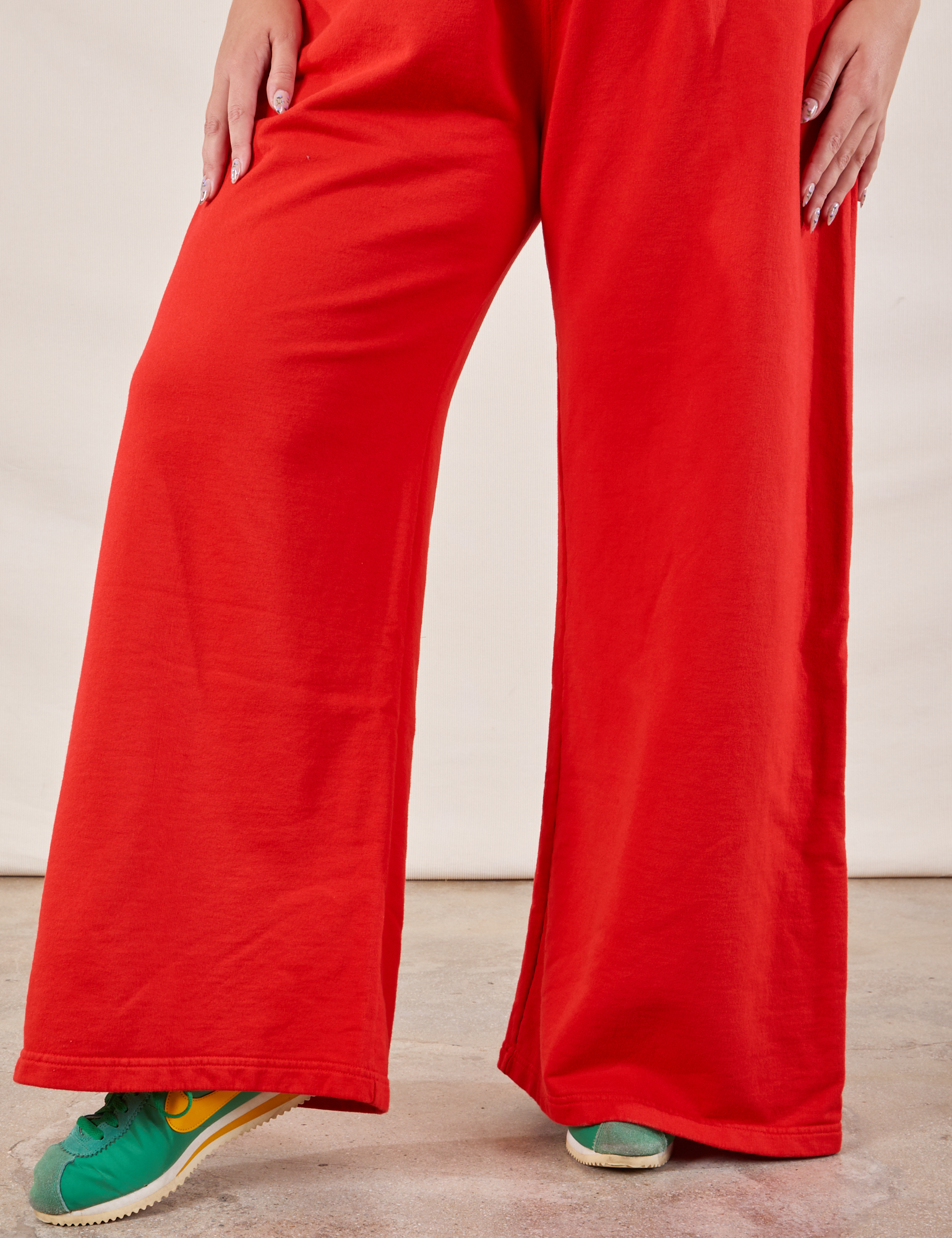 Wide Leg Sweat Pants in Mustang Red pant leg close up on Ryan