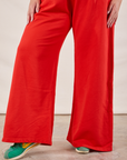 Wide Leg Sweat Pants in Mustang Red pant leg close up on Ryan