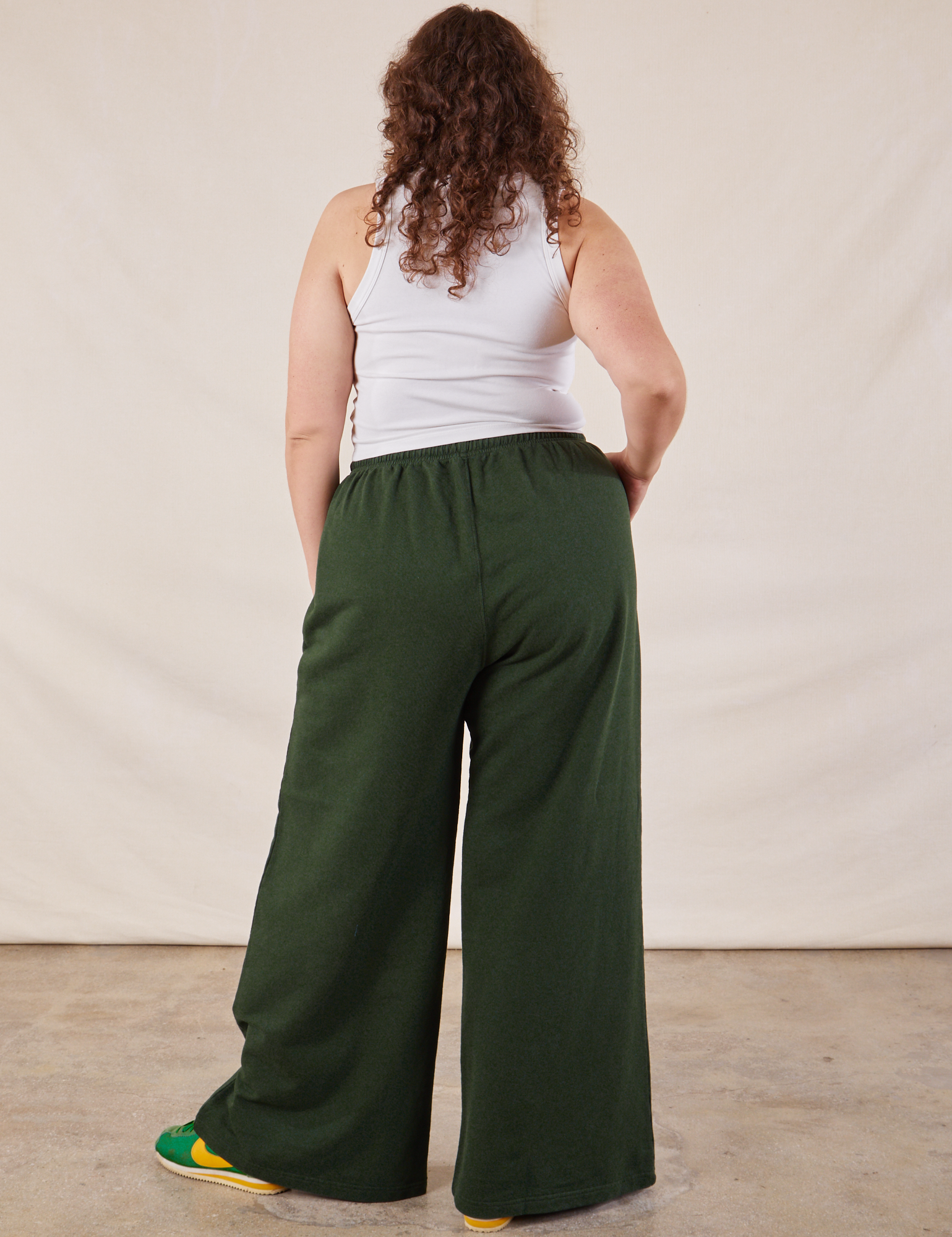 Wide Leg Sweat Pants in Swamp Green back view on Ryan