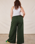 Wide Leg Sweat Pants in Swamp Green back view on Ryan