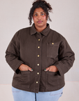 Morgan is wearing a buttoned up Denim Work Jacket in Espresso Brown