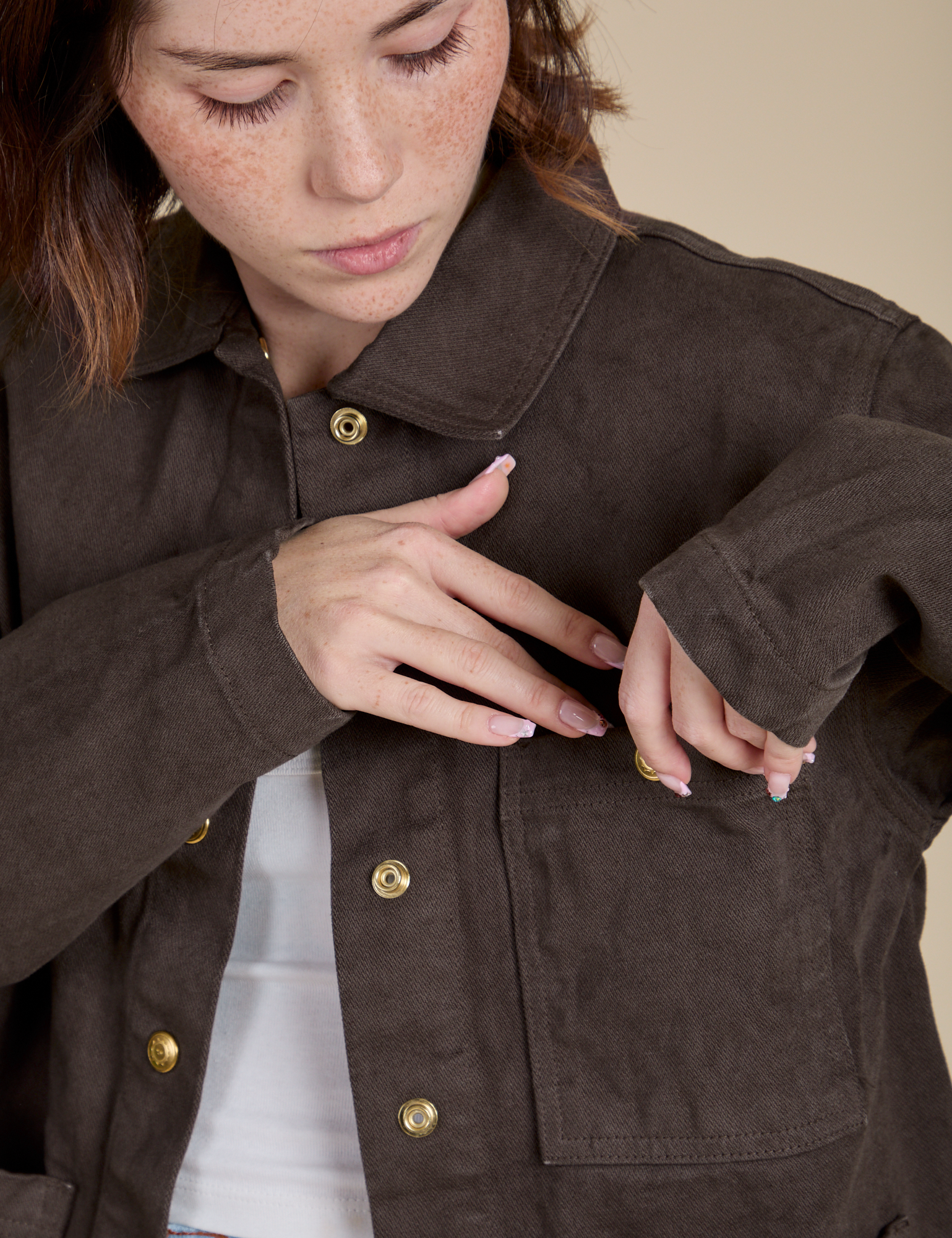 Close up of Denim Work Jacket in Espresso Brown on Hana
