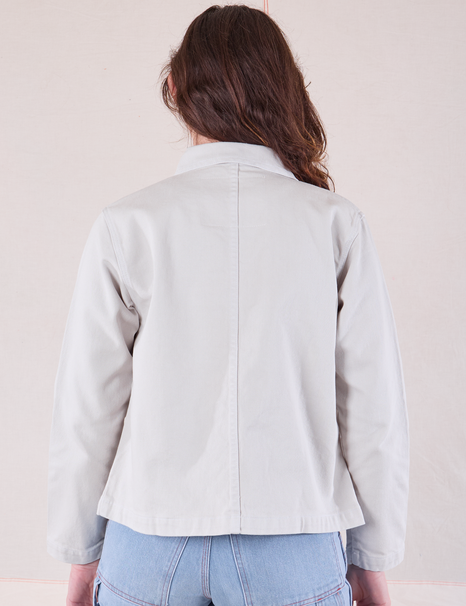 Denim Work Jacket in Stone White back view on Alex