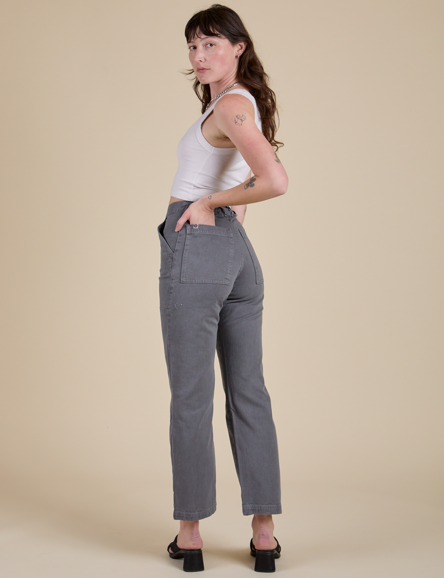 Angled back view of Work Pants in Washed Grey on Alex