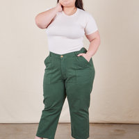 Ashley is 5'7" and wearing Petite 1XL Work Pants in Dark Emerald Green paired with vintage off-white Baby Tee