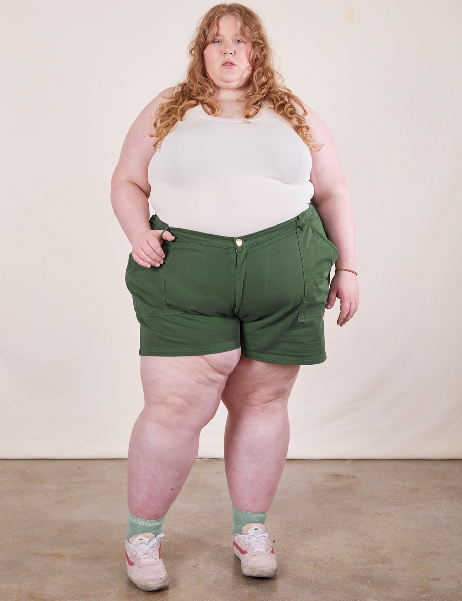Catie is 5'11" and wearing size 5XL Classic Work Shorts in Dark Emerald Green paired with vintage off-white Tank Top