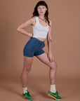 Side view of Classic Work Shorts in French Blue and Cropped Tank in Vintage Tee White