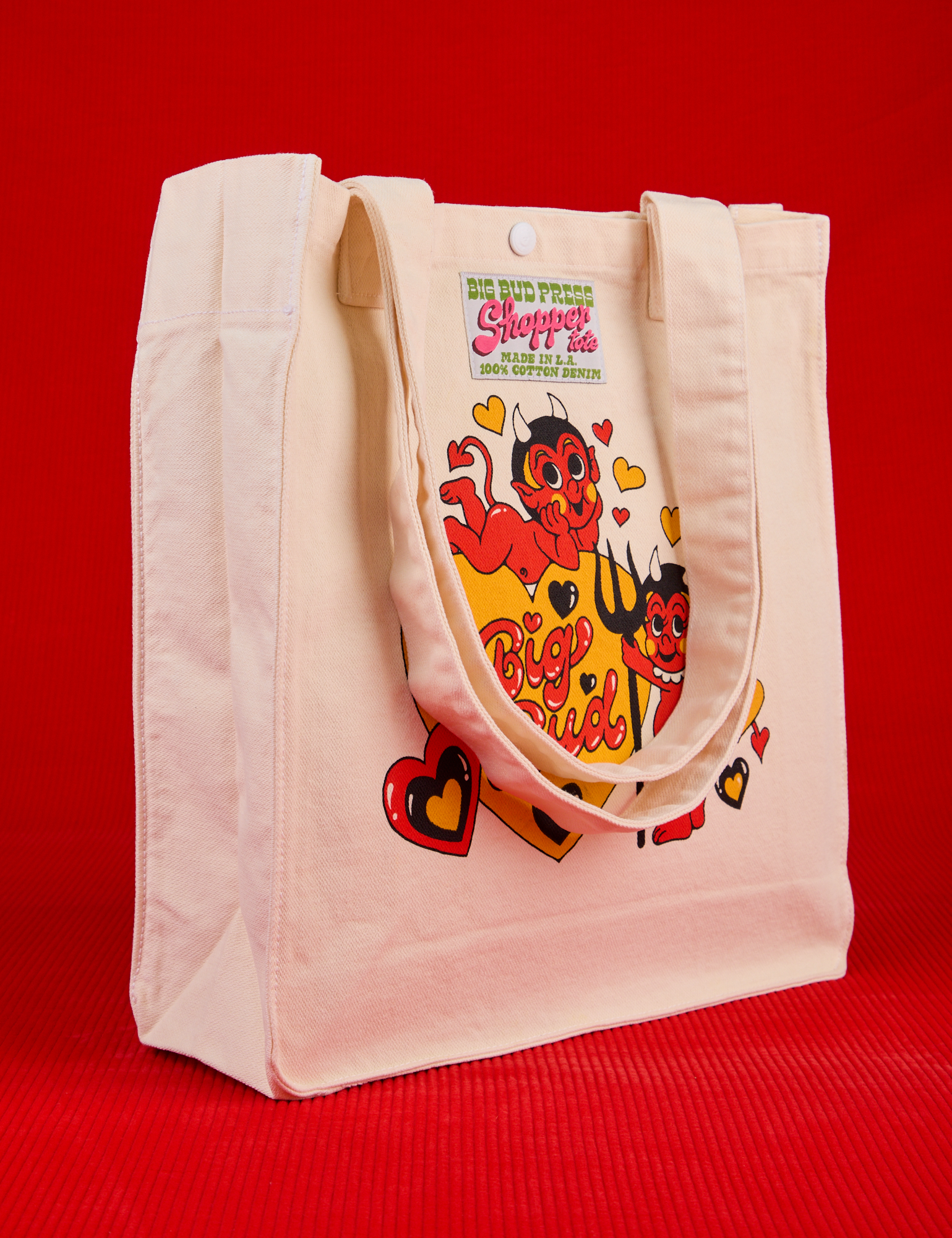 Angled front view of Devil Big Bud Shopper Tote