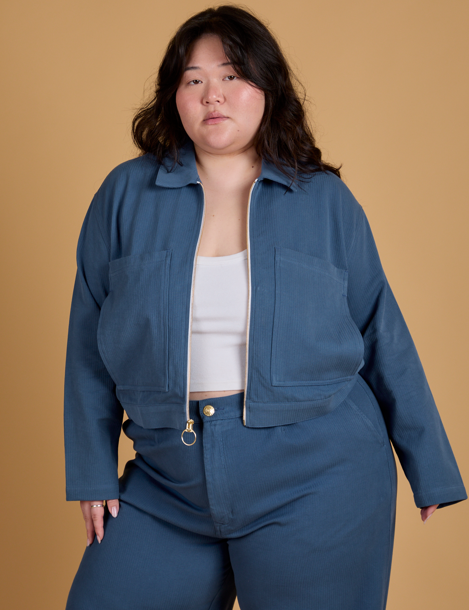 Ashley is 5’7” and wearing L Heritage Mechanic Jacket in French Blue