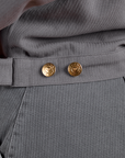 Close up of brass buttons on Heritage Mechanic Jacket in Washed Grey