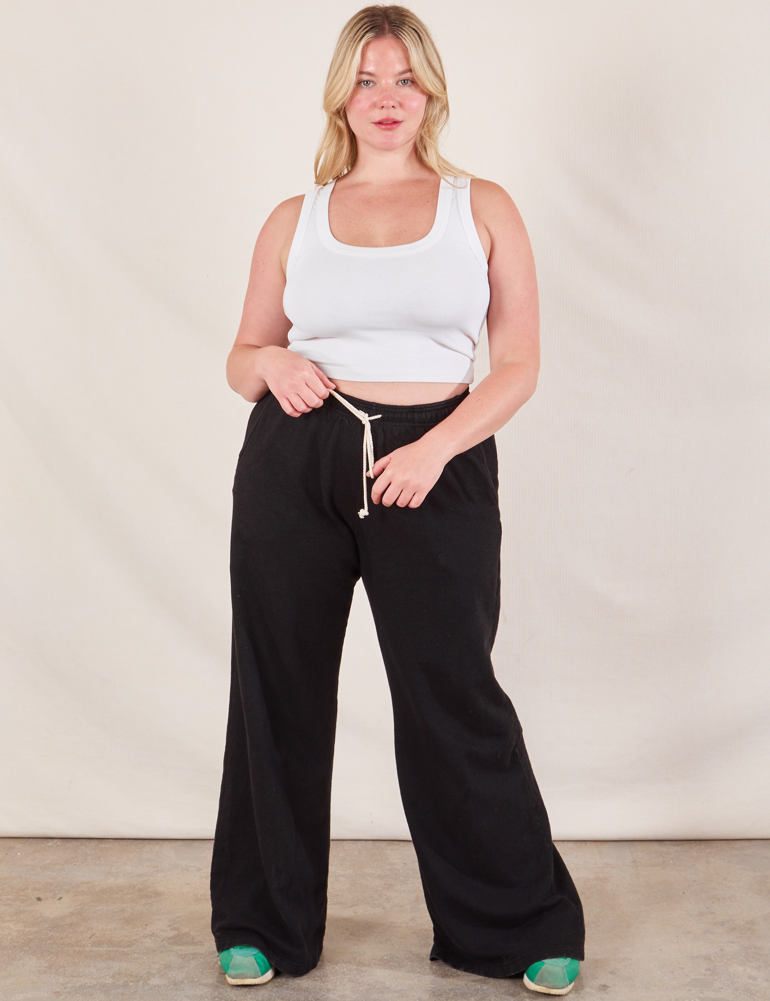 Lish is wearing Wide Leg Sweat Pants in Basic Black and Cropped Tank