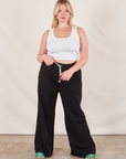 Lish is wearing Wide Leg Sweat Pants in Basic Black and Cropped Tank