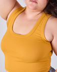 Cropped Tank Top in Mustard Yellow close up on Ashley