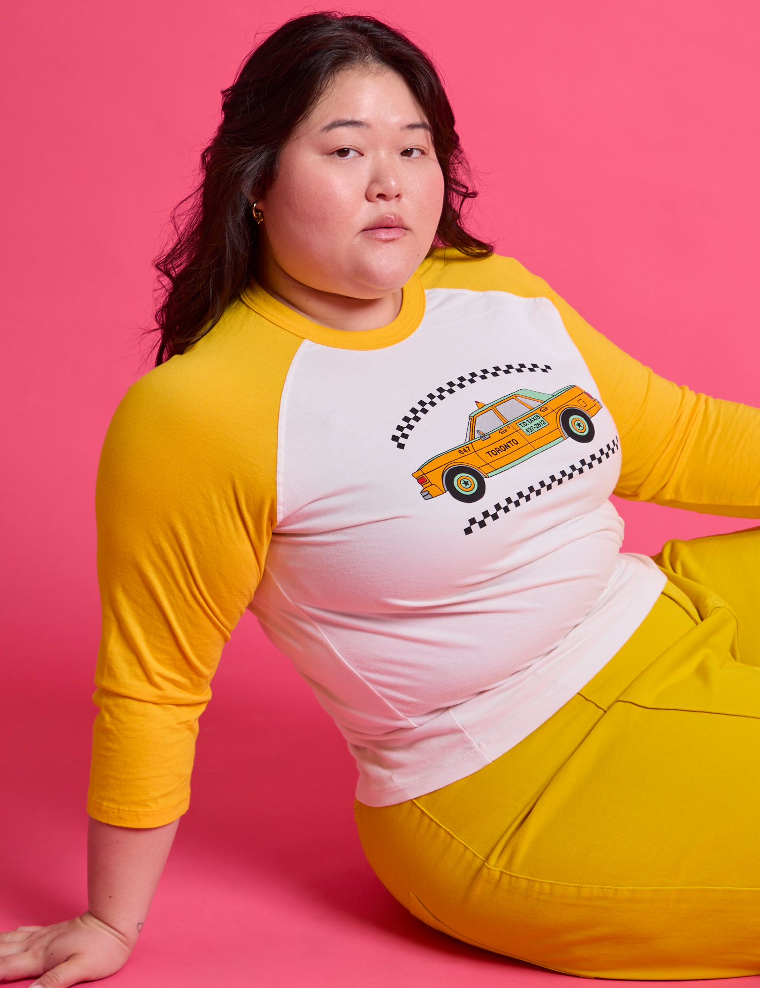 Taxi Raglan Tee in Toronto worn by Ashley