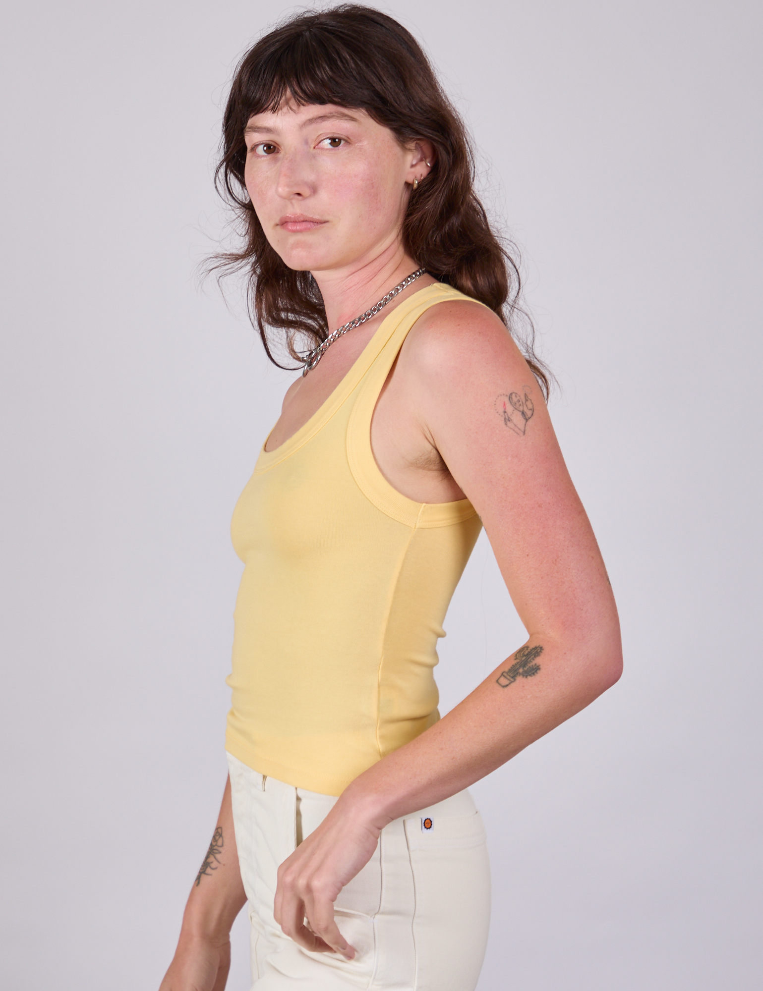 Tank Top in Butter Yellow side view on Alex