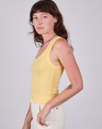 Tank Top in Butter Yellow side view on Alex