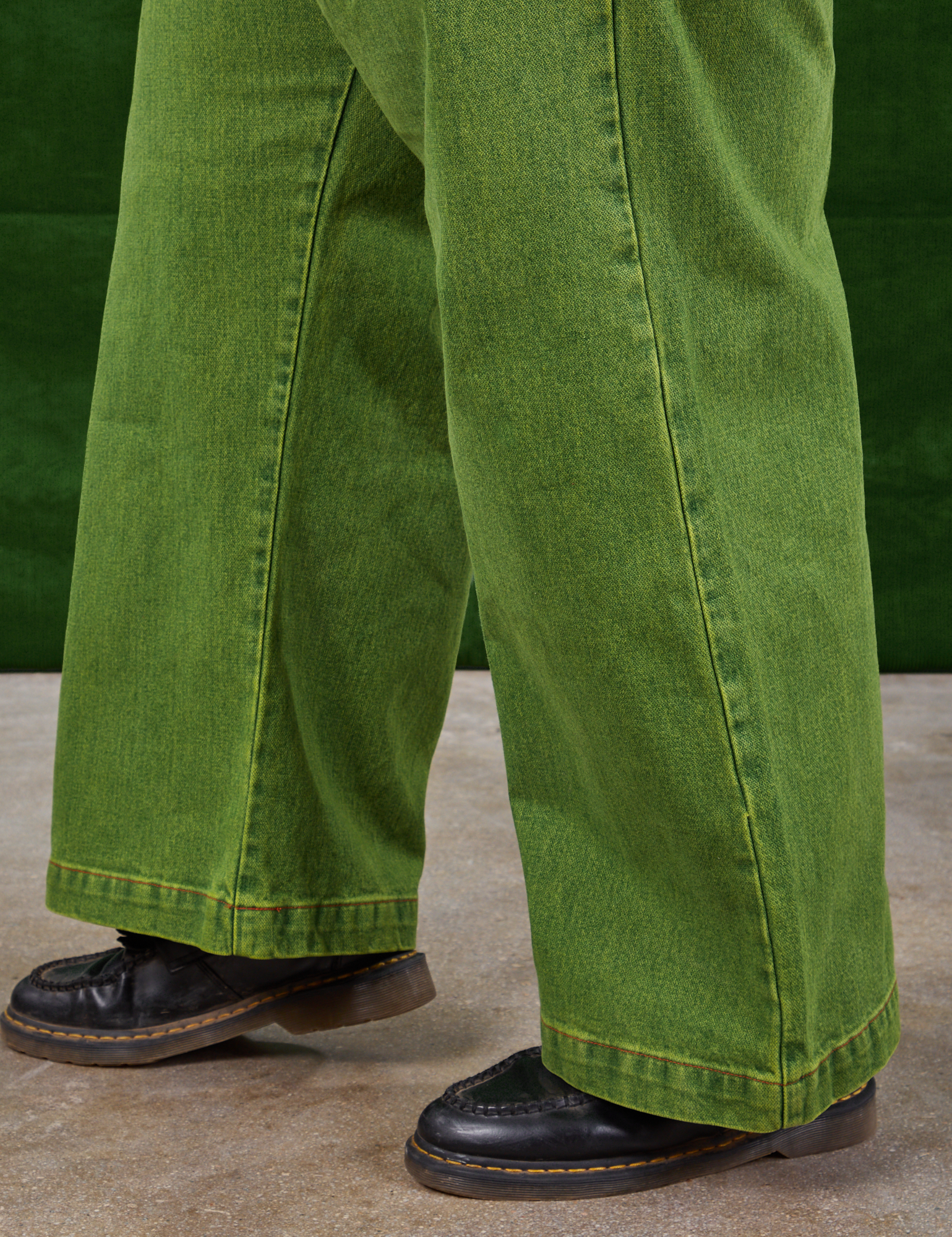 Overdyed Wide Leg Trousers in Gross Green side view close up on Sam