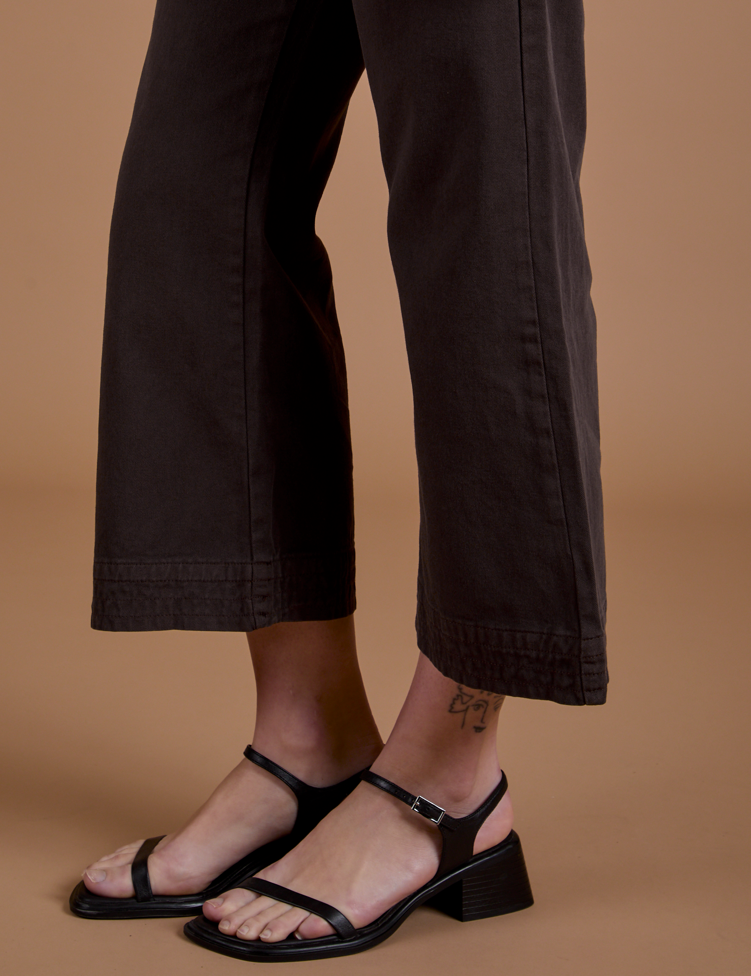 Side view pant leg close up of Work Pants in Espresso Brown on Alex
