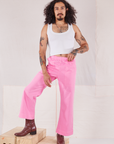Jesse is 5'8" and wearing XXS Action Pants in Bubblegum Pink paired with Cropped Tank in vintage tee off-white