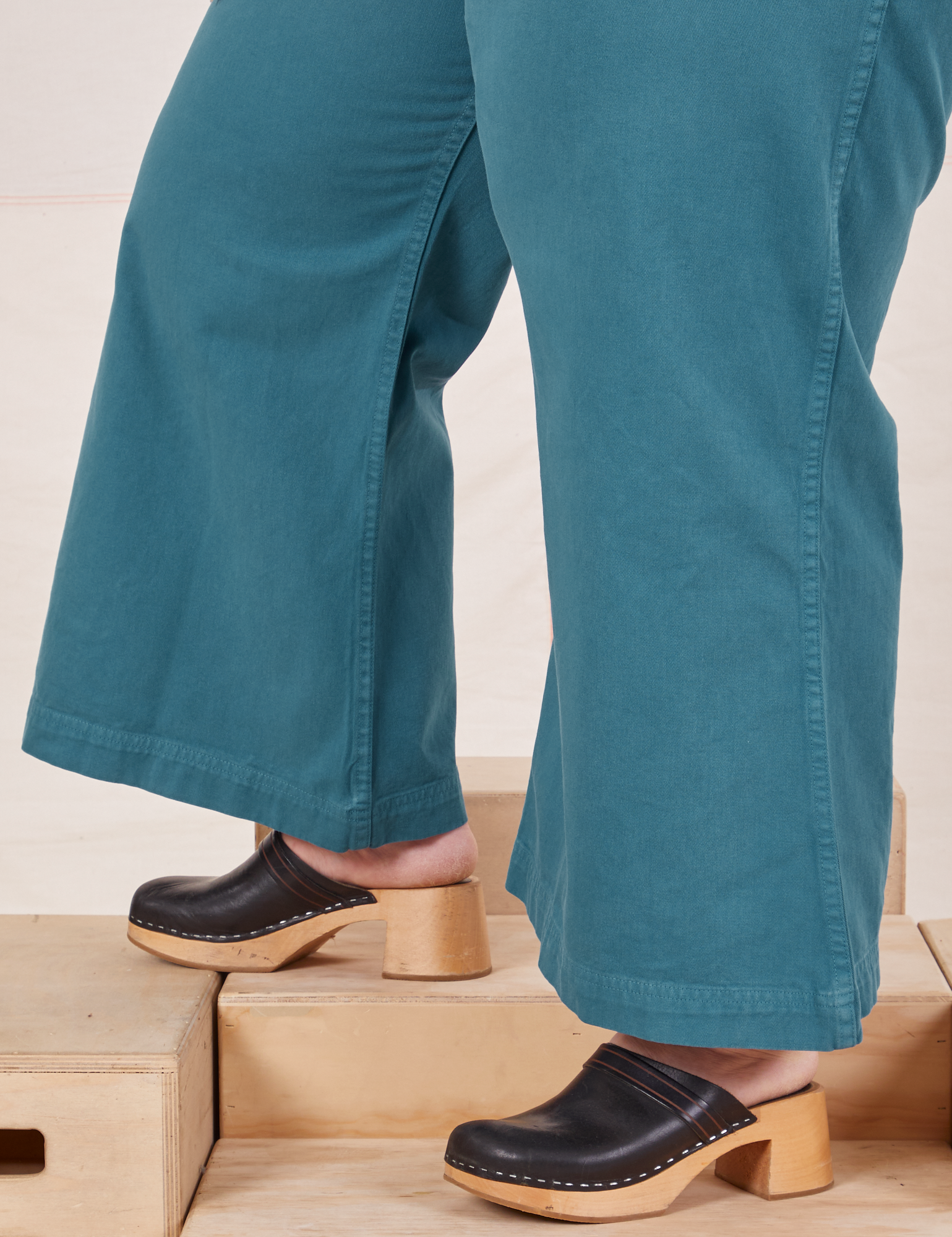 Petite Bell Bottoms in Marine Blue pant leg side view close up on Ashley