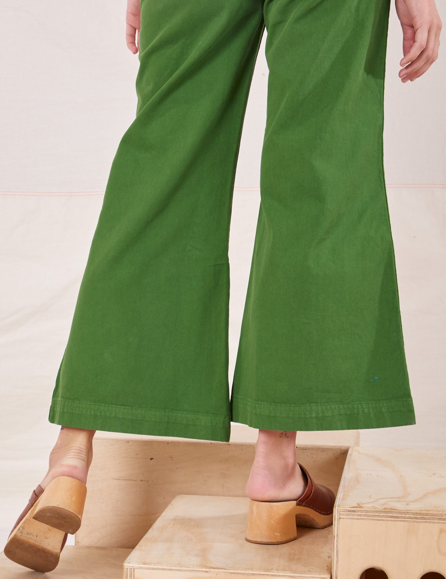 Bell Bottoms in Lawn Green back leg close up on Alex
