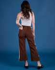 Painted Action Pants in Fudgesicle Brown back view on Alex