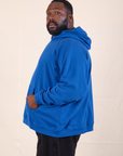 Oversized Hoodie in Royal Blue side view on Elijah