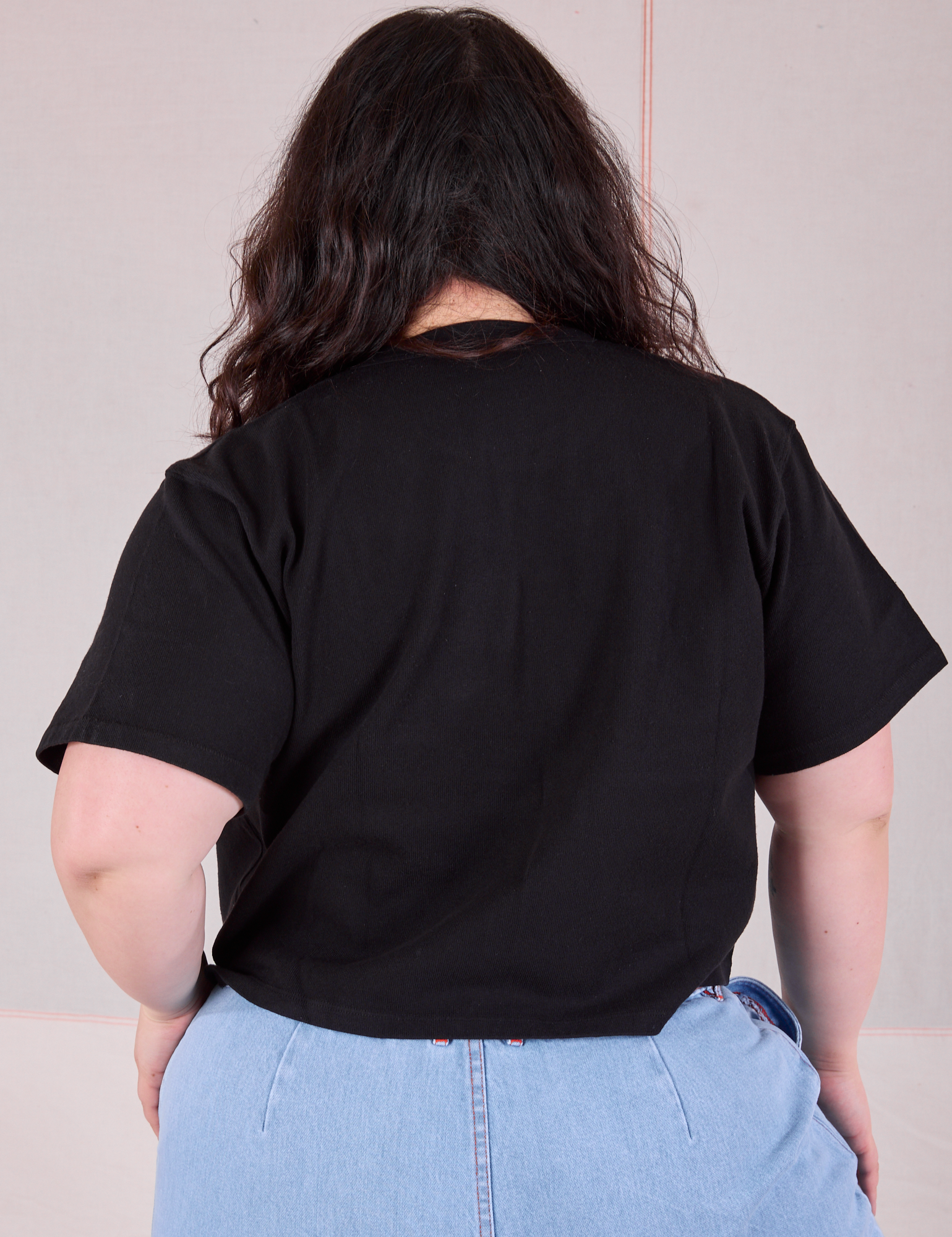 Cropped Burly Tee in Basic Black back view on Ashley