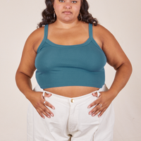 Alicia is 5'9" and wearing XL Cropped Cami in Marine Blue paired with vintage off-white Western Pants