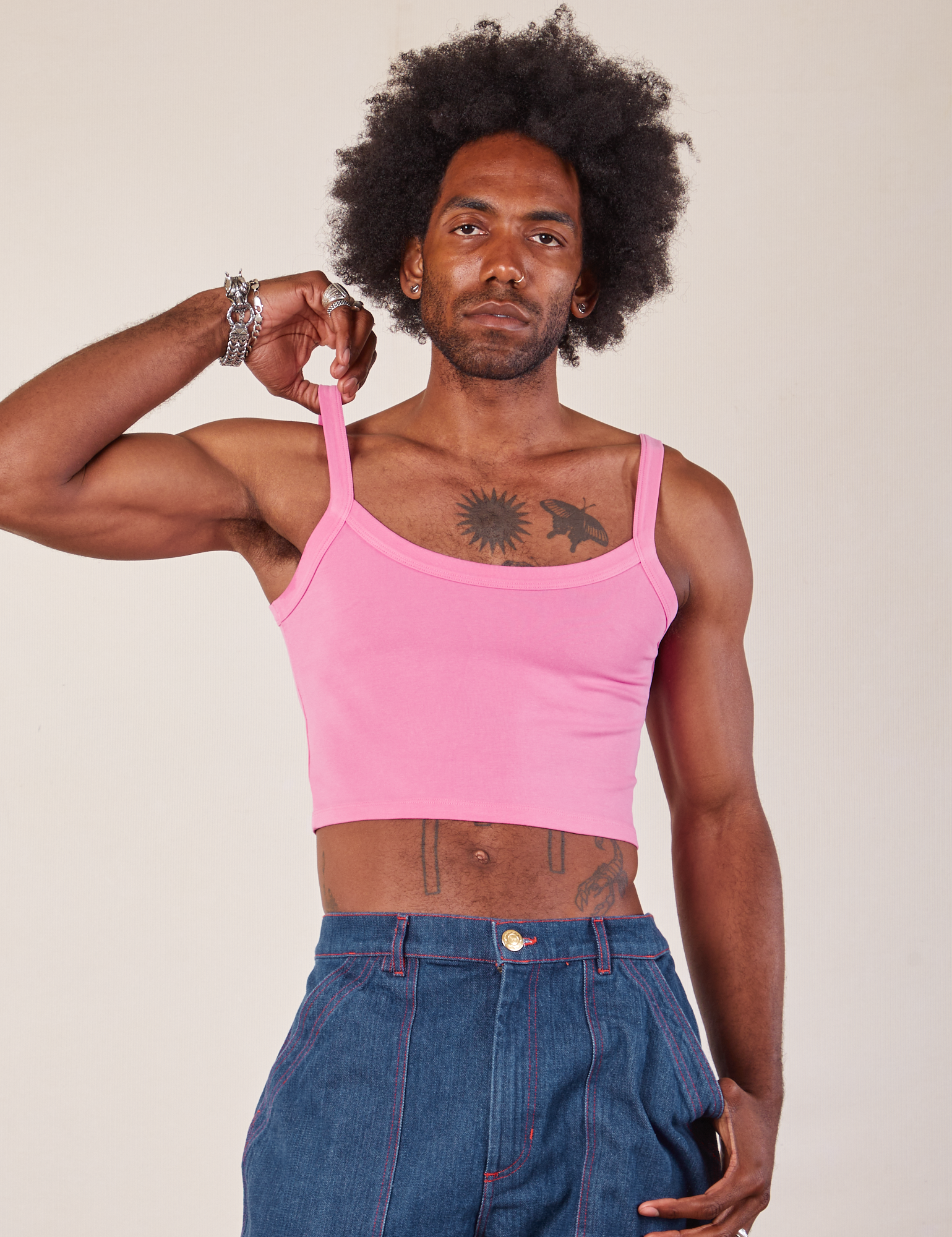 Jerrod is 6’3” and wearing S Cropped Cami in Bubblegum Pink