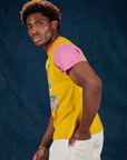 Vintage Tee in Bubblegum side view on Isaac