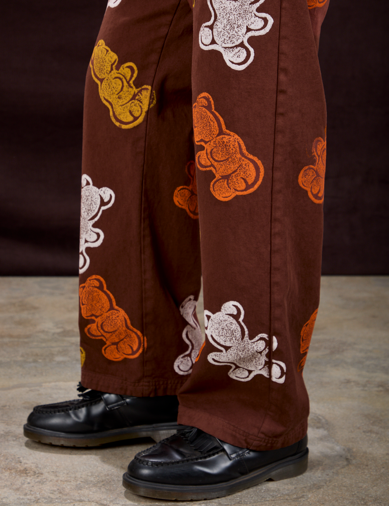 Gummy Bear Paintstamped Work Pants in Fudgesicle Brown pant leg close up on Isaac