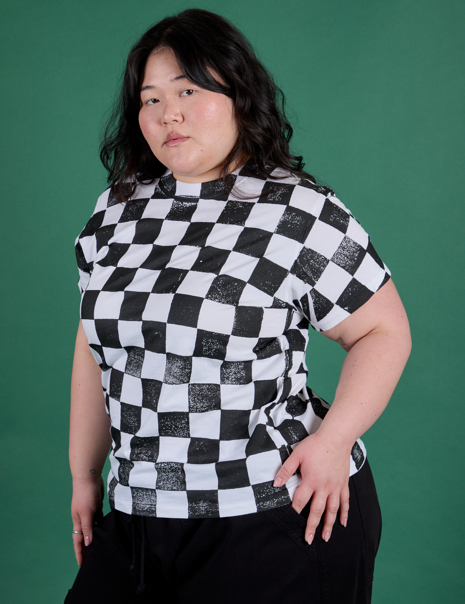 Checker Organic Tee in Black angled front view on Ashley