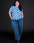 Ashley is wearing Checker Organic Tee in Blue and Drop Pocket Cargo Pants in French Blue