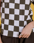 Checker Organic Tee in Espresso Brown close up on Alex