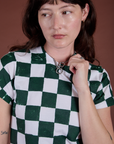 Checker Organic Tee in Swamp Green front close up on Alex
