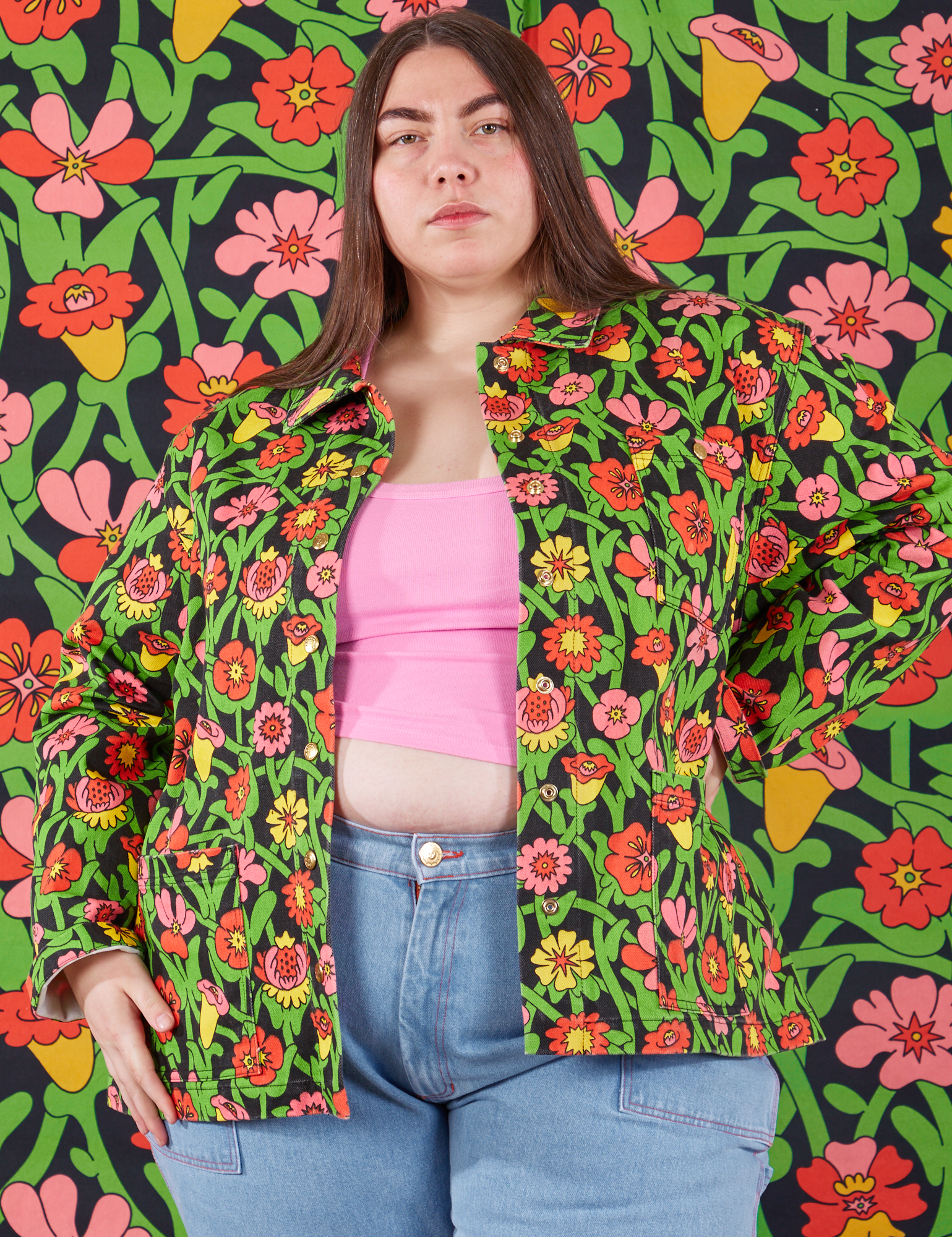 Marielena is wearing Flower Tangle Work Jacket with a bubblegum pink Cropped Tank underneath