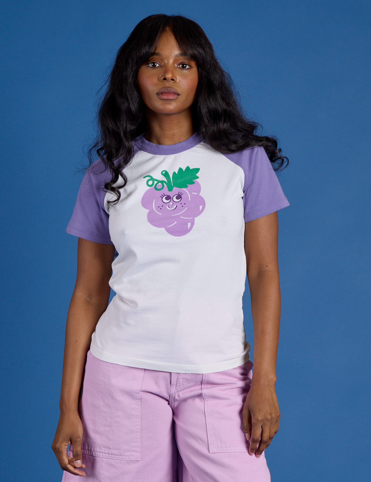Kandia is wearing Produce Raglan Tee in Grape