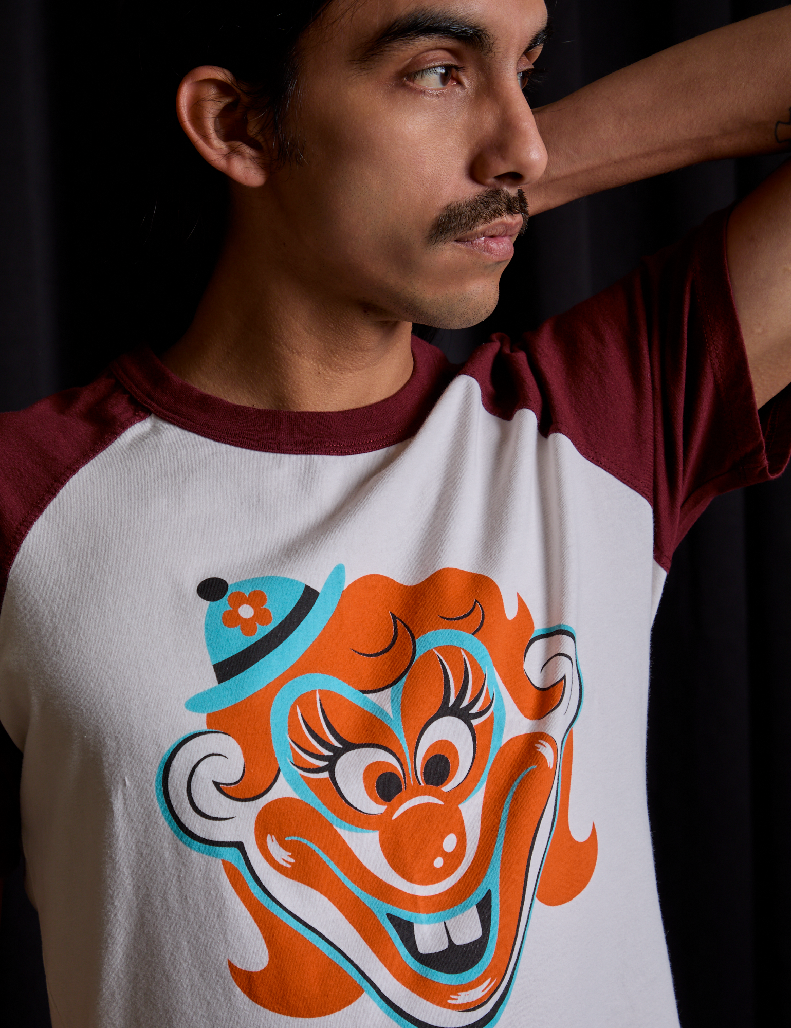Front close up of Raglan Tee in Clown on Anthony