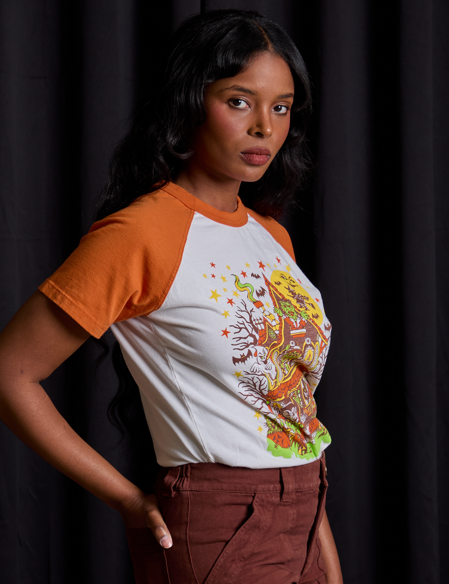 Short Sleeve Raglan Tee in Haunted House side view on Kandia