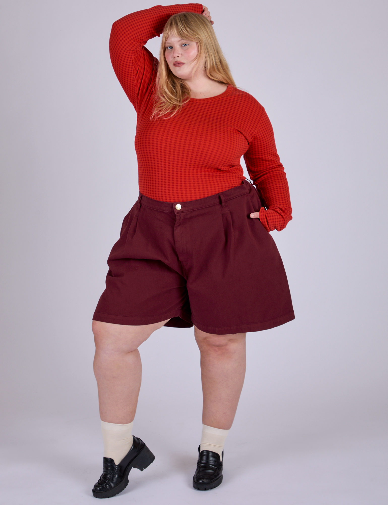 Pleated Trouser Shorts in Red Wine and mustang red Long Sleeve Gingham Baby Tee on Juliet