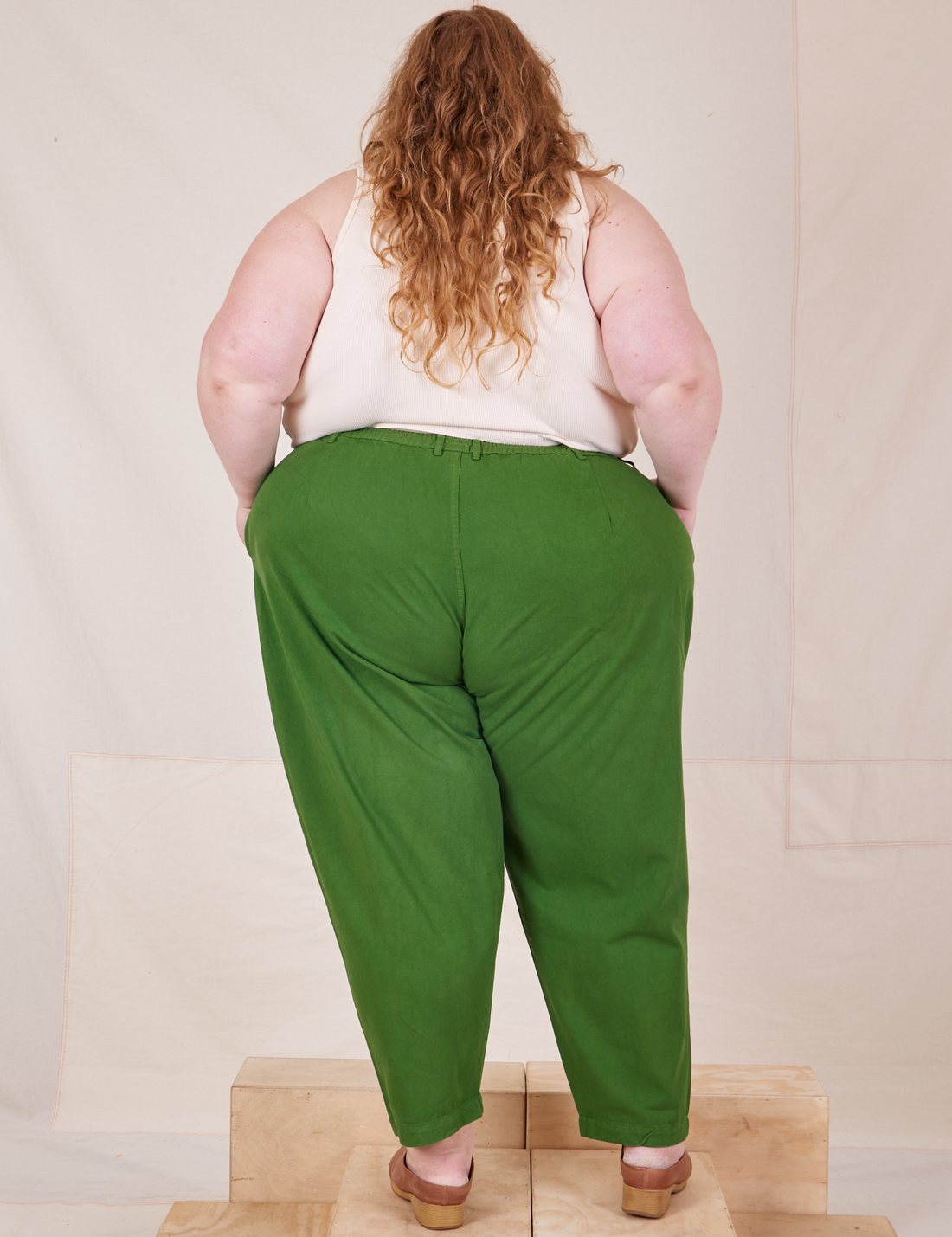 Back view of Heavyweight Trousers in Lawn Green worn by Catie