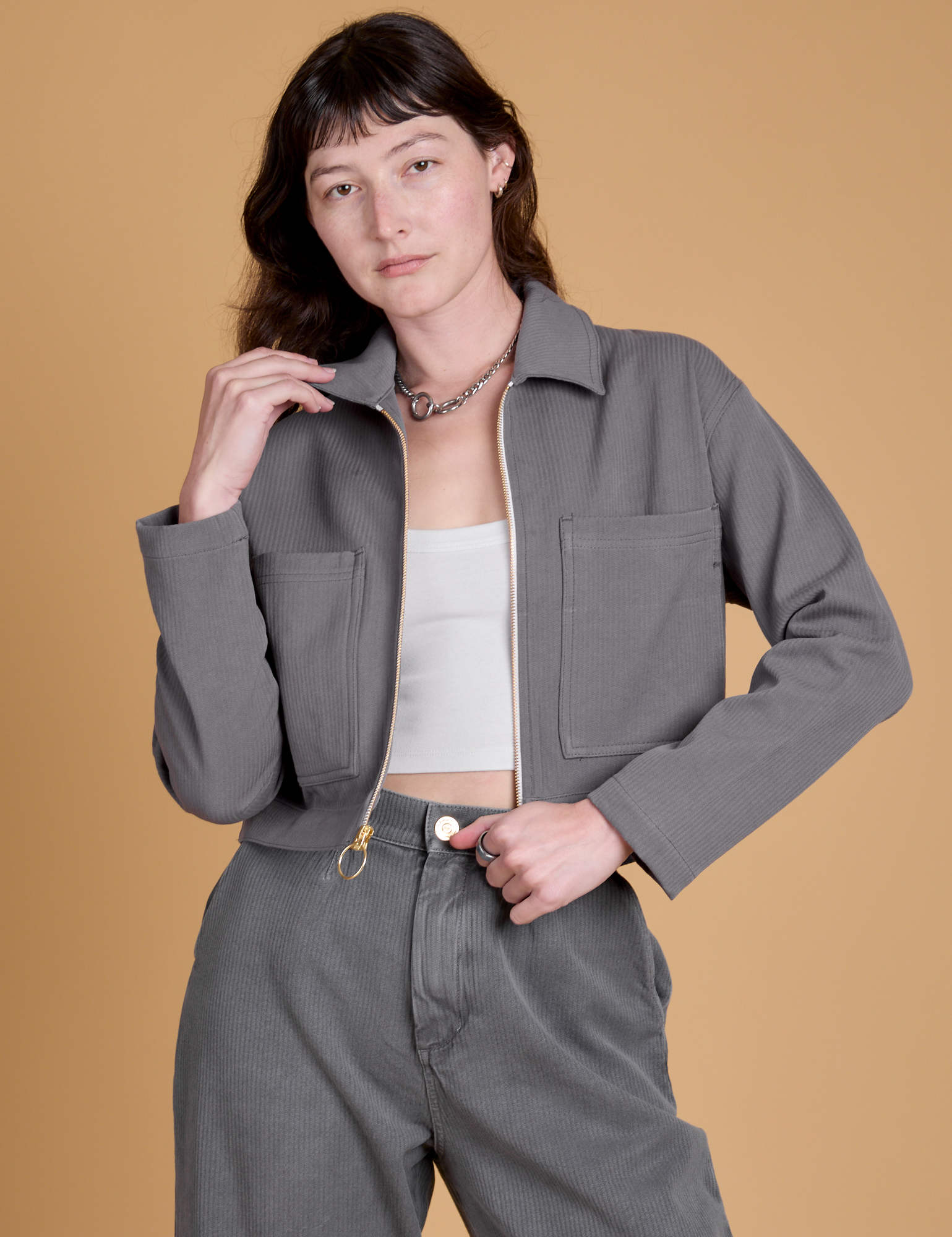 Alex is 5’8” and wearing P Heritage Mechanic Jacket in Washed Grey